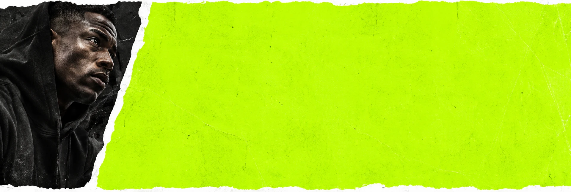 Urban portrait beside electric-lime torn paper